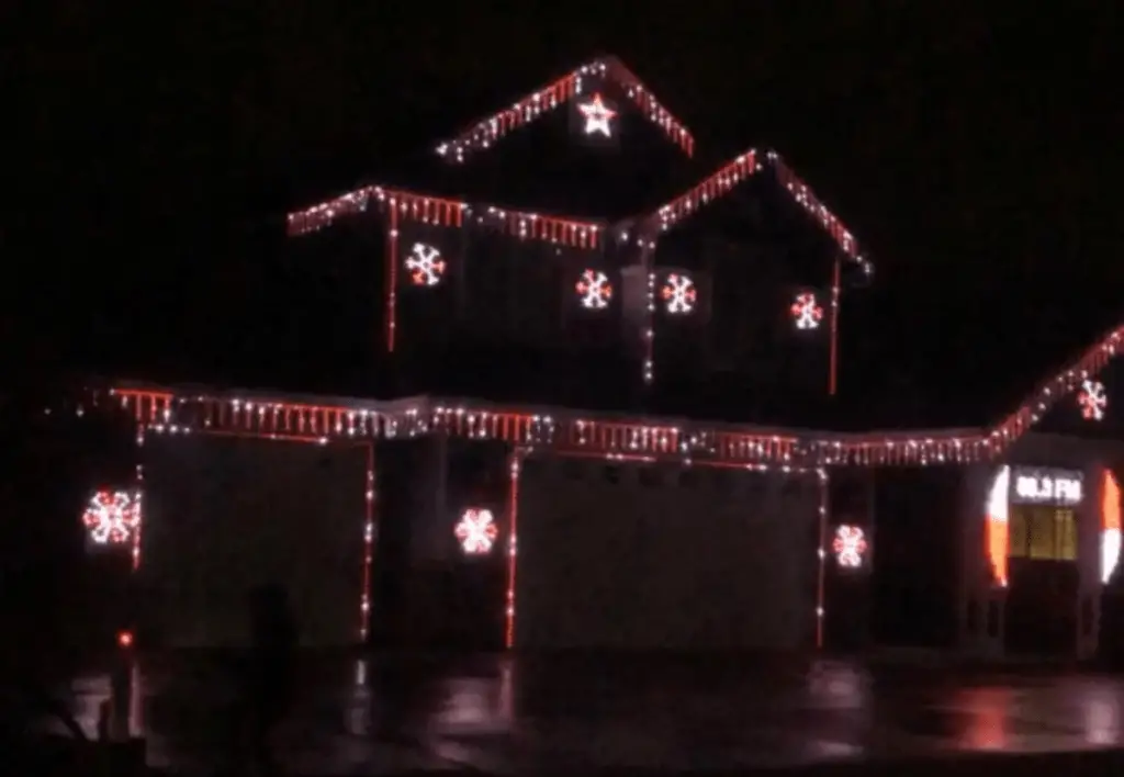 Christmas Lights synced with music strung across a house in Boise.
