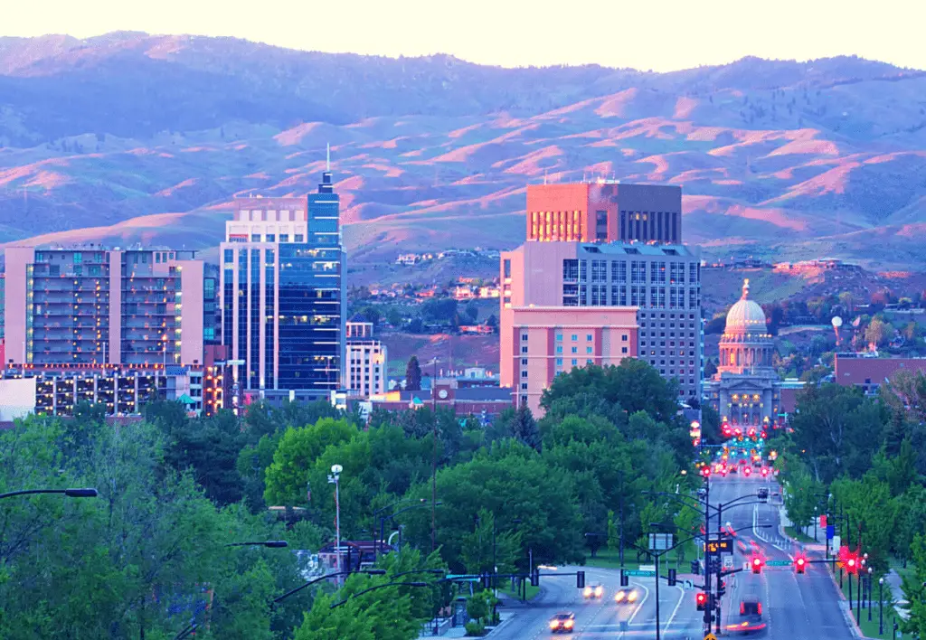 Downtown Boise, Idaho and the capitol building, with a picturesque mountain backdrop.